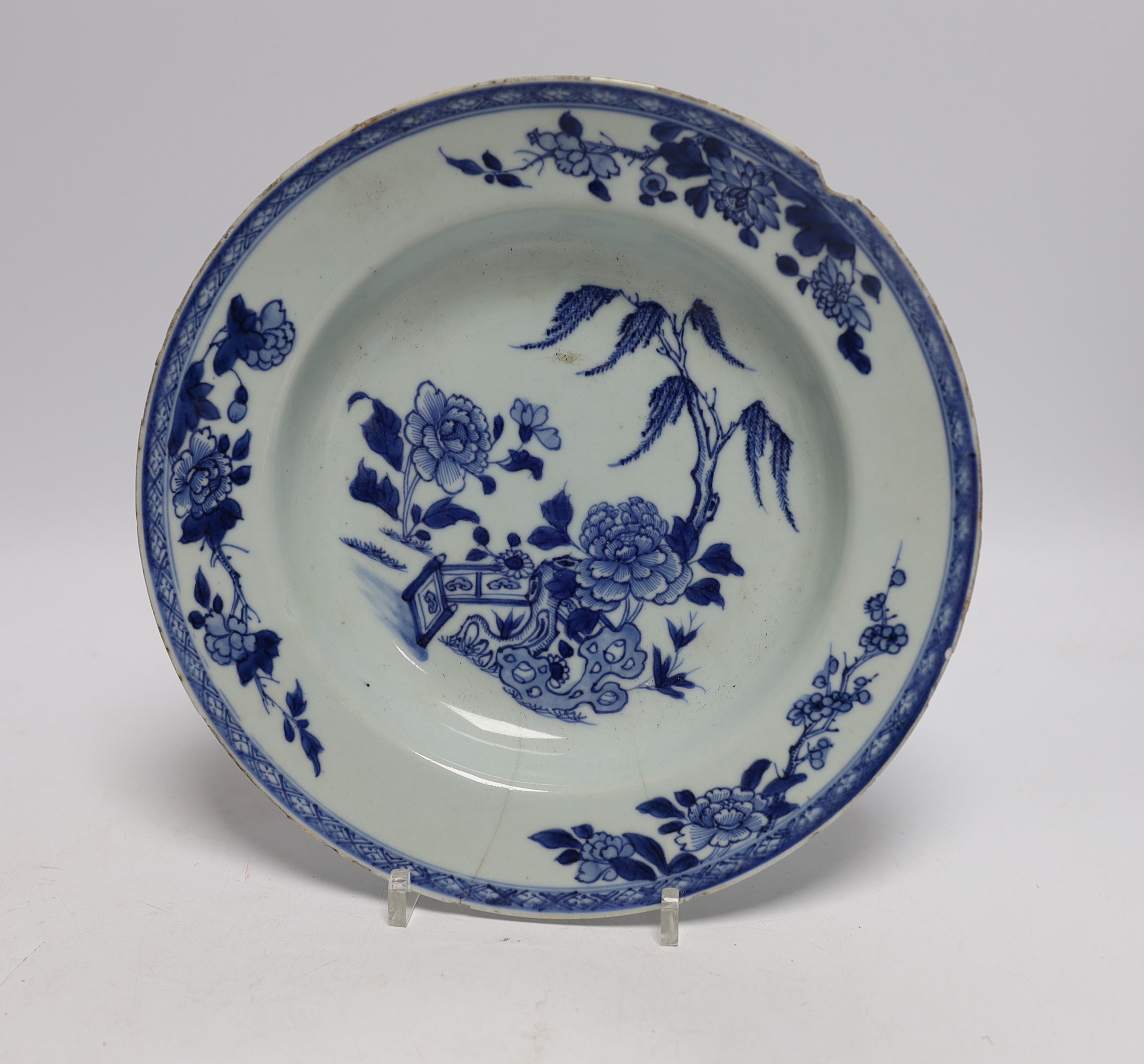 A group of Chinese ceramics including a flambé vase, an 18th century blue and white floral plate and a similar lid, 25cm diameter